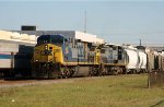 CSX 407 & 7328 lead train Q451 past train P092 at the station